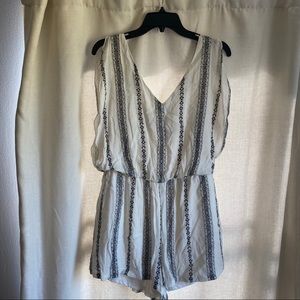 Super cute black and cream romper